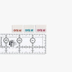 Cute AF! Woven Labels by KATM in vibrant colors next to a ruler.