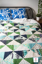 Patchwork Flying Geese Quilt Pattern by Quilty Love | Stash Buster Quilt Pattern