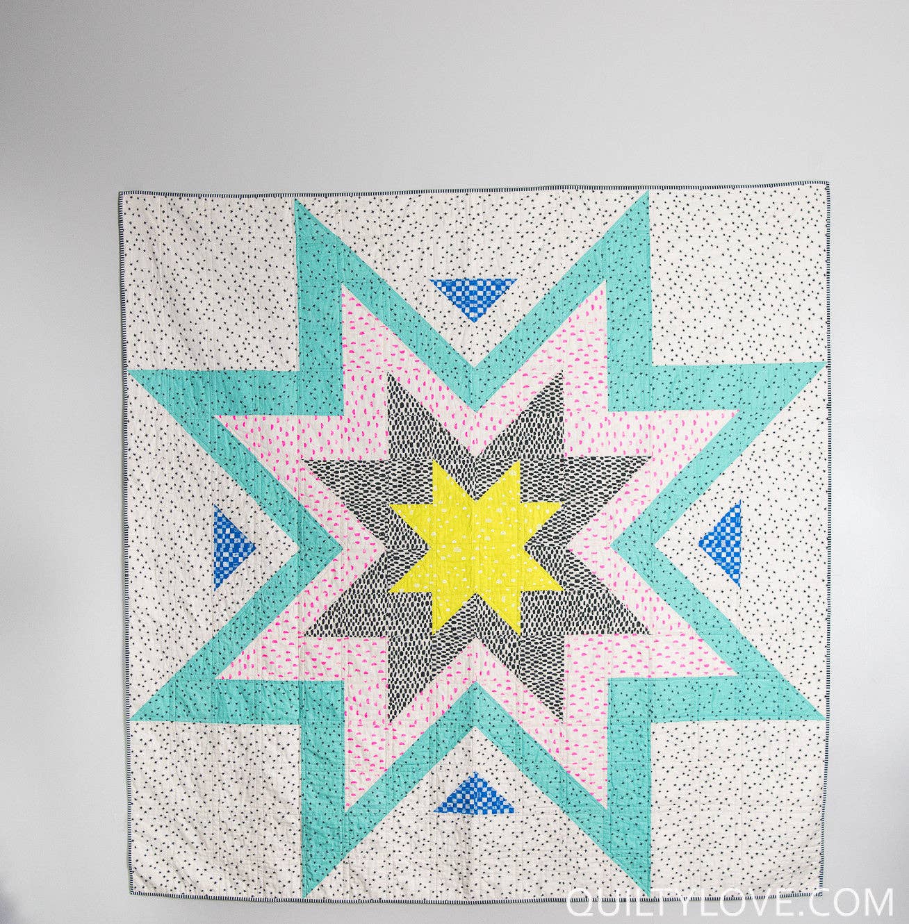 Expanding Stars Quilt Pattern by Quilty Love | Modern Star Quilt Pattern