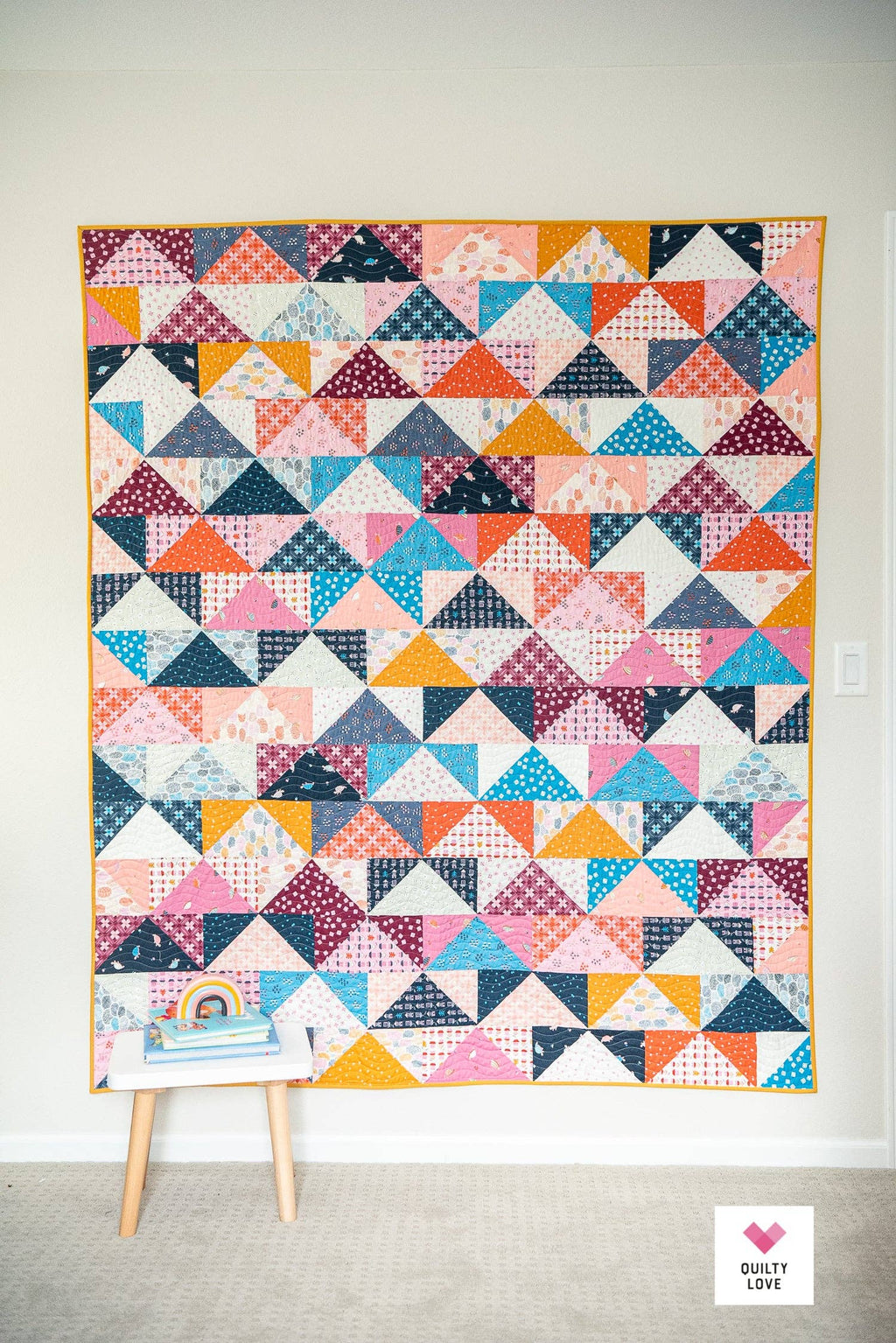 Patchwork Flying Geese Quilt Pattern by Quilty Love | Stash Buster Quilt Pattern