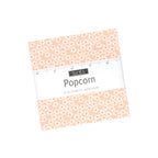 Popcorn by Elizabeth Hartman charm pack for Moda, a stack of 5-inch squares with a paper wrapper over a peach daisy print.