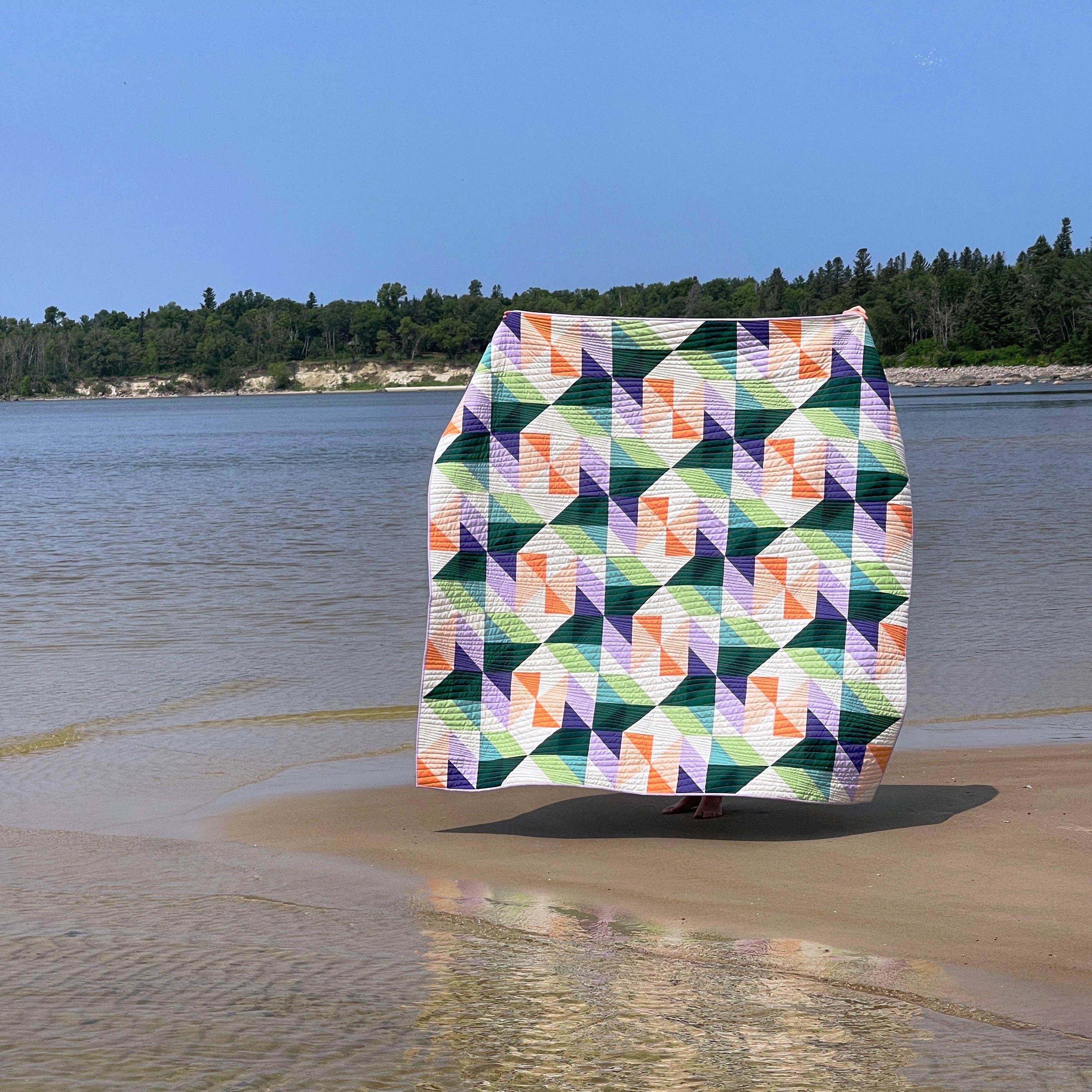 Quilt made with the Victoria Beach Quilt Pattern by The Blanket Statement Quilt Co
