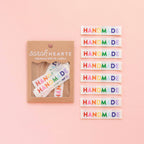 Packaging of 'HANDMADE' labels by Sarah Hearts on a pink background