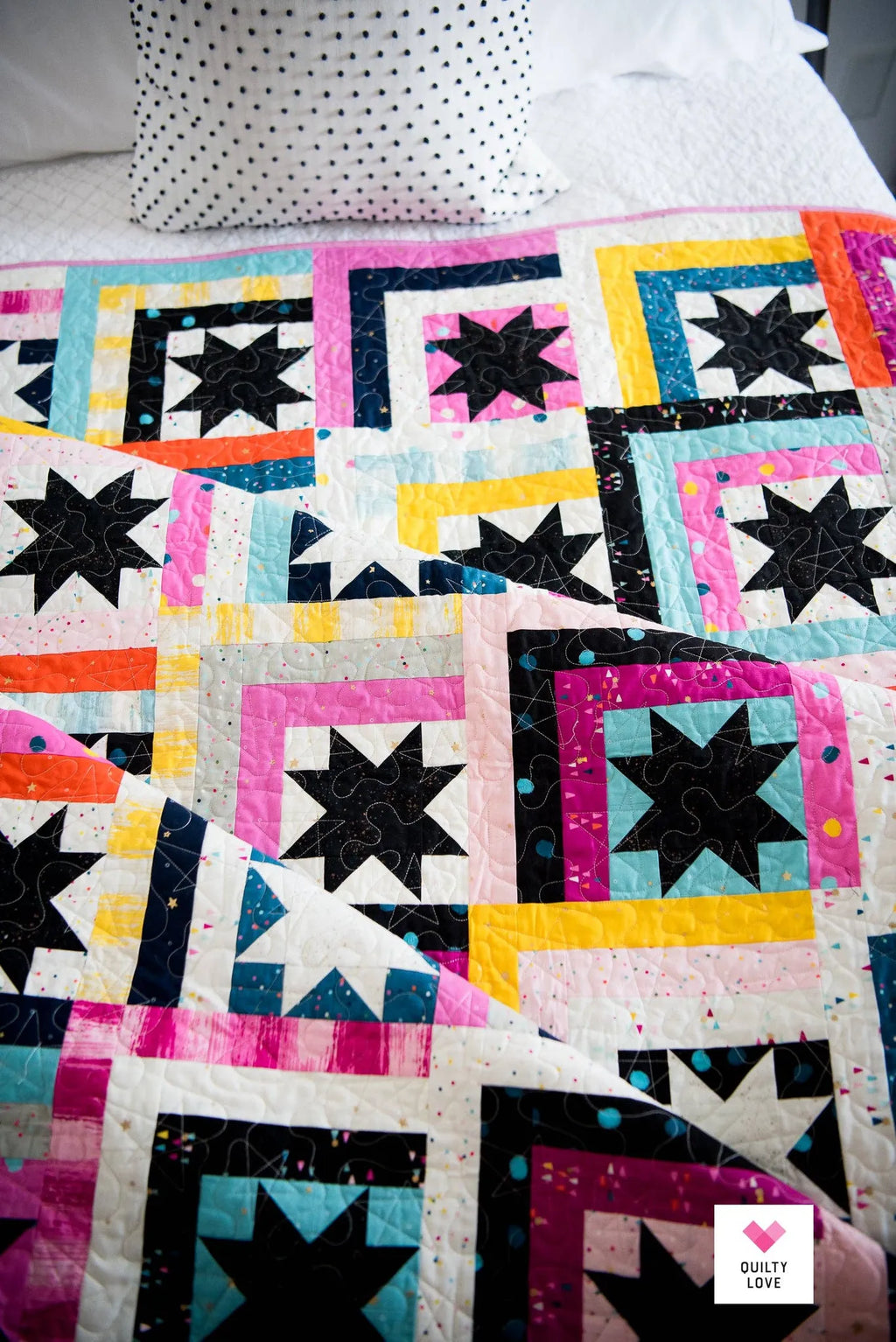 Lifestyle qilt shot of Log Cabin Stars by Quilty Love