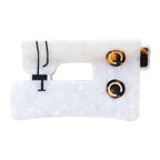 Sewing machine hair clip with tortoiseshell pattern on a white background from Sarah Hearts