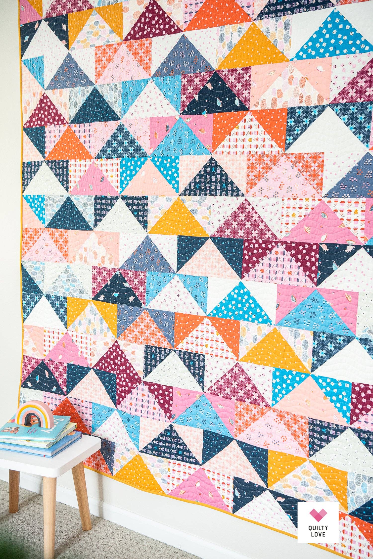 Patchwork Flying Geese Quilt Pattern by Quilty Love | Stash Buster Quilt Pattern