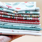Cherry Orchard 11-piece fat quarter bundle by Bernadett Urbanovics for FIGO Fabrics featuring vintage cherries, florals, gingham and coordinating quilting prints