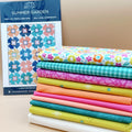 Ghostly Garden Quilt Kit with Summer Garden Pattern by Running Stitch Quilts and Ghostly Garden Coordinating Quilting Fabric and Art Gallery Pure Solids