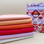 Growing Pen + Paper Quilt Kit with Art Gallery Pure Solids in Reds, Oranges and  Purple Pinks