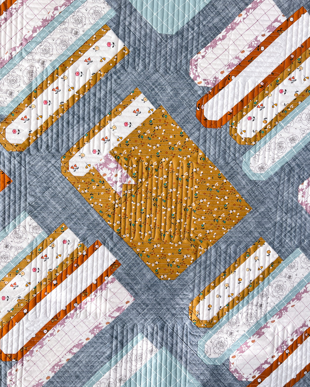 Book Nook beginner-friendly scrappy book block quilt pattern by Pen + Paper Patterns