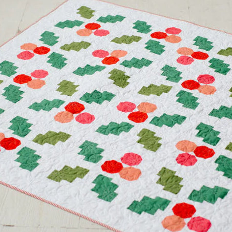 Holly Jolly beginner-friendly Christmas quilt from the Modern Holiday Quilt Collection