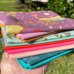 Curated Fat Quarter Bundle featuring a selection of Celestial Garden Fabrics with coordinating Art Gallery solids and blenders