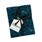 23 fat quarters from the Fireglow collection showing red and coral dragons, green scrollwork, and teal scales.