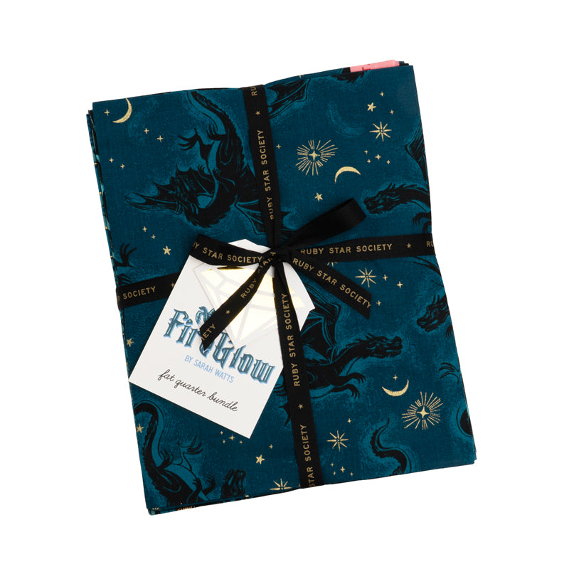 23 fat quarters from the Fireglow collection showing red and coral dragons, green scrollwork, and teal scales.