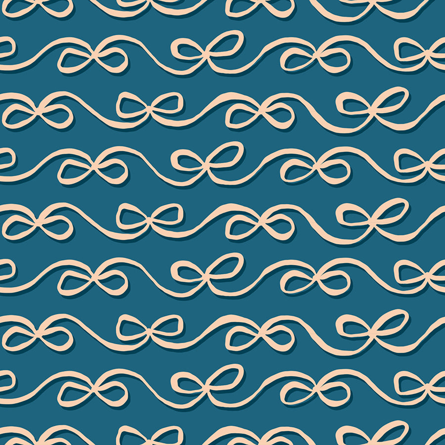 Graphic quilting cotton fabric pattern from the Corsage collection by Ruby Star Society. The design features horizontal rows of flowing cream ribbons tied into sweet ditsy bows with dark drop shadows, repeating across a solid, rich teal blue background.