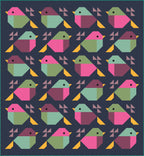 Sparrows quilt design by Pen + Paper patterns in Smells Like Teen Spirit colors, featuring 24 pink, plum, sage and seafoam birds with yellow tails on a Art Gallery Pure Solids Night Sea (navy) background.
