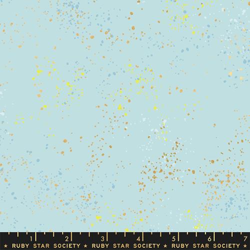 Fabric swatch with a light blue background and small colorful dots, labeled 'Ruby Star Society'.