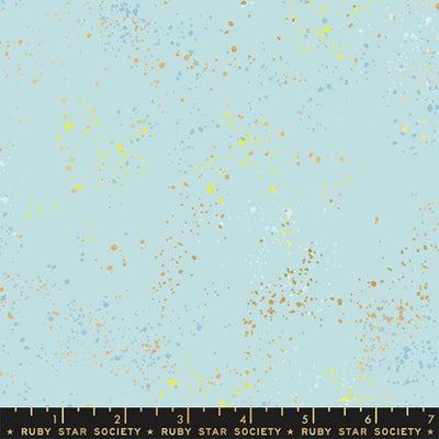 Fabric swatch with a light blue background and small colorful dots, labeled 'Ruby Star Society'.