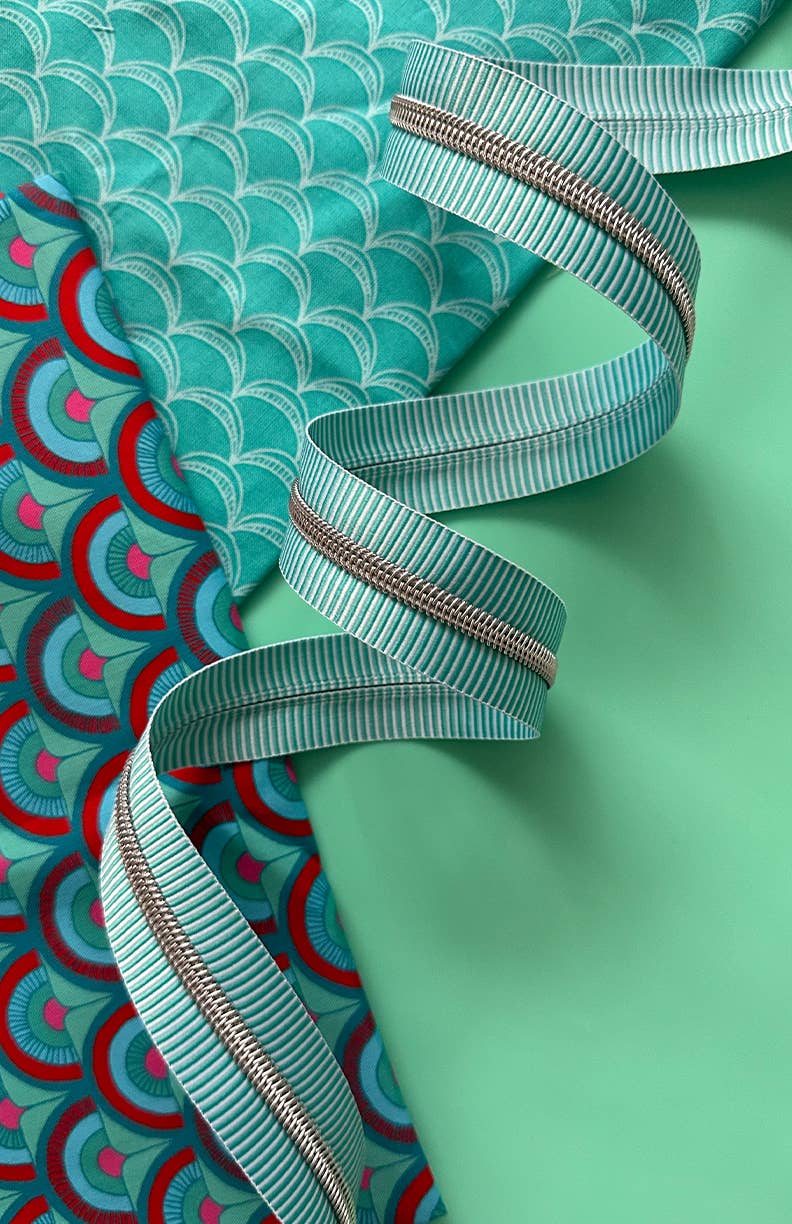 Teal and white zipper tape by Sassafras Lane Design
