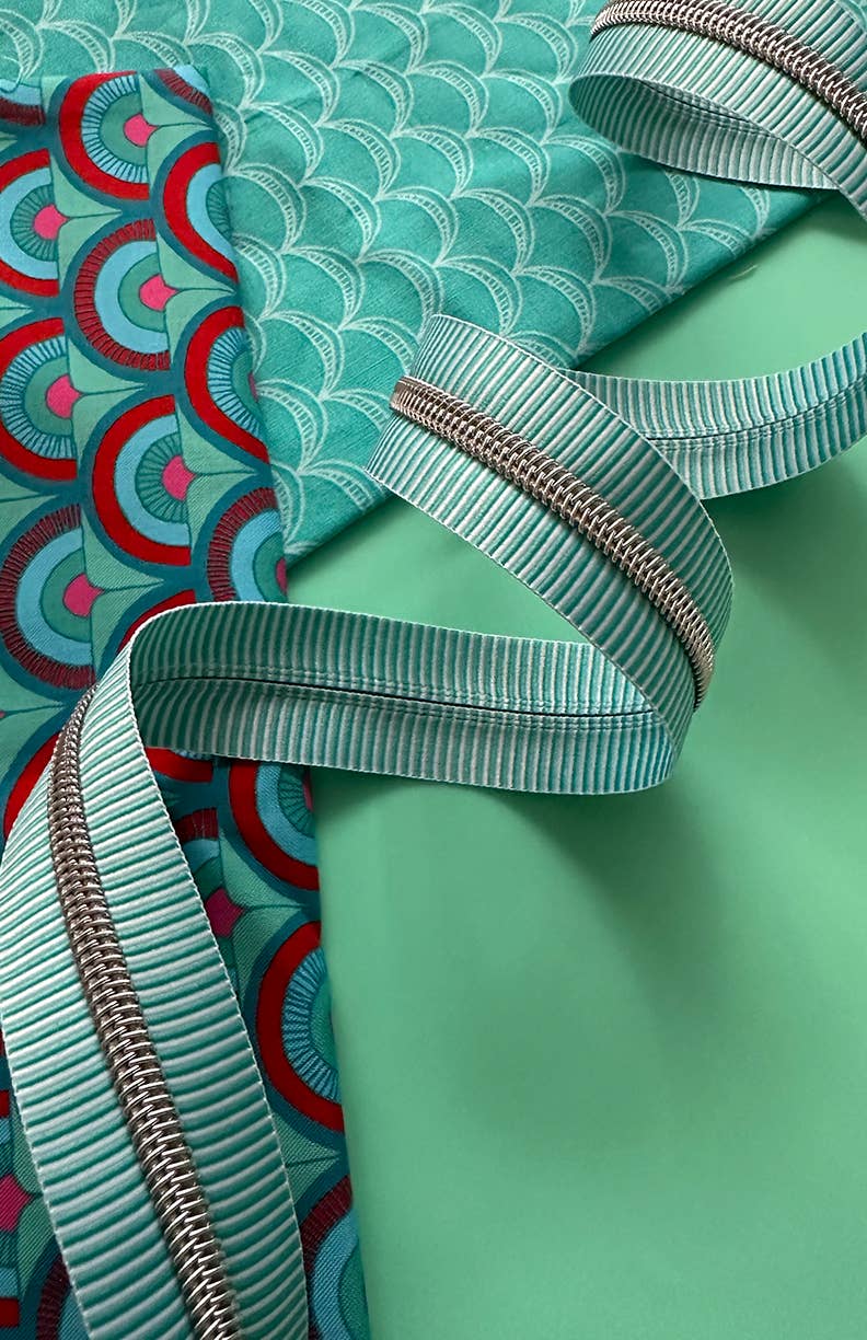 Teal and white zipper tape by Sassafras Lane Design