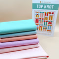 Top Knot Quilt Kit with Pastel colorway of Art Gallery Fabrics Pure Solids