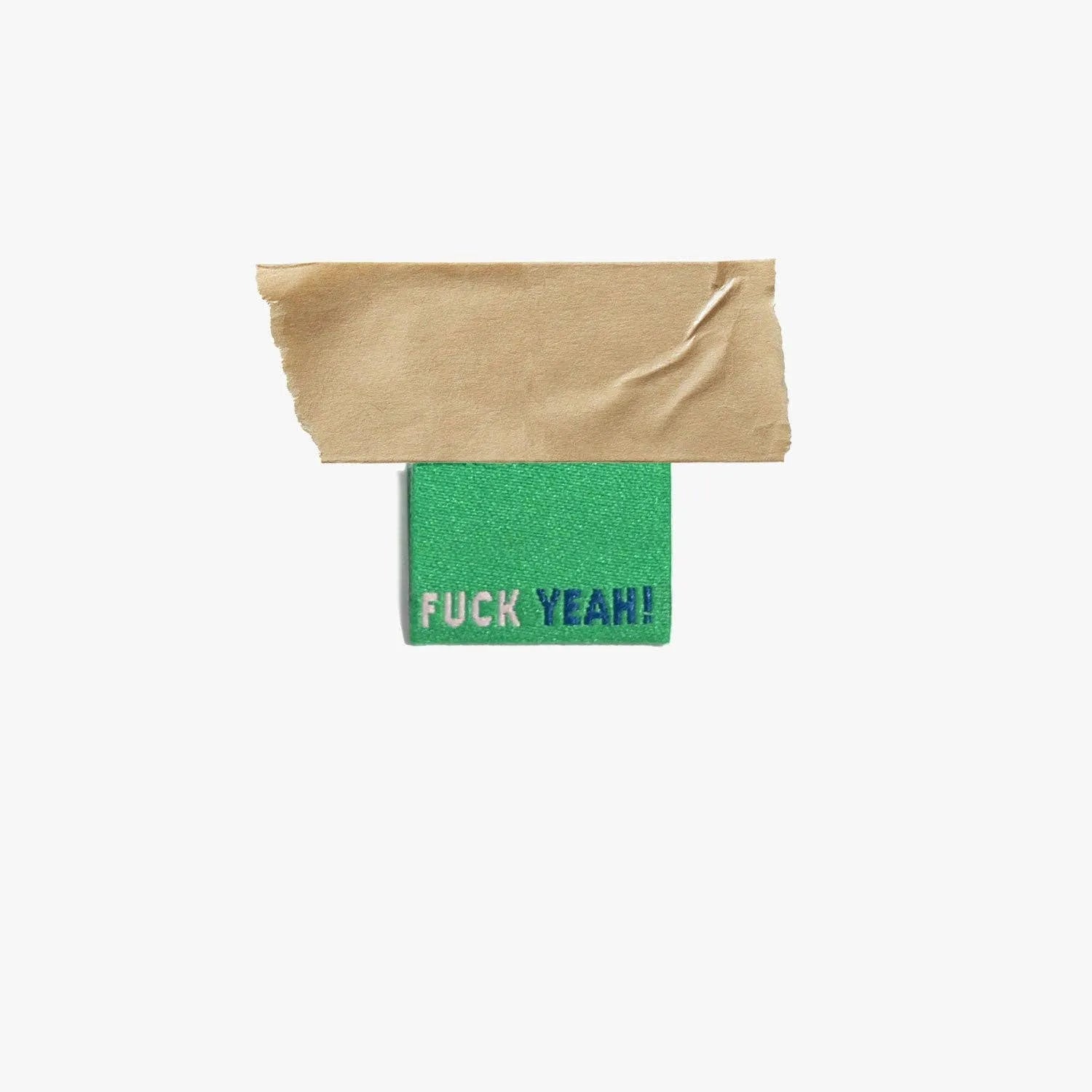 Fuck Yeah! Woven Labels by KATM, vibrant green with bold text.