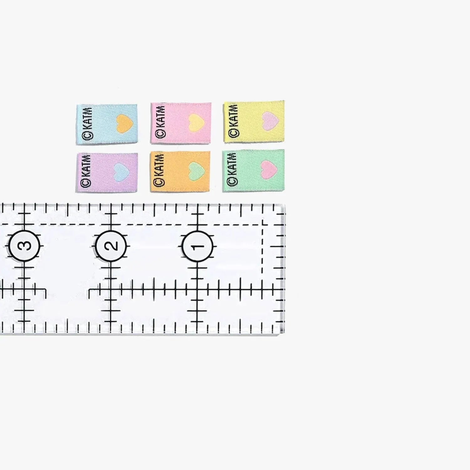 Mighty Minis Woven Labels by KATM in pastel colors with heart icons.