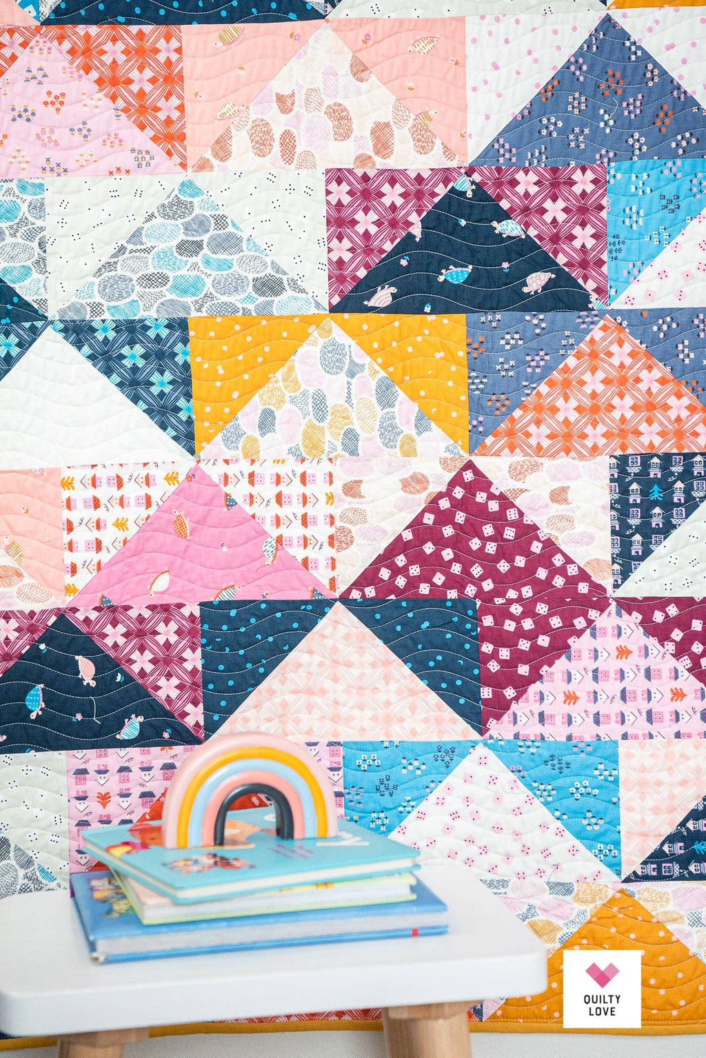 Patchwork Flying Geese Quilt Pattern by Quilty Love | Stash Buster Quilt Pattern