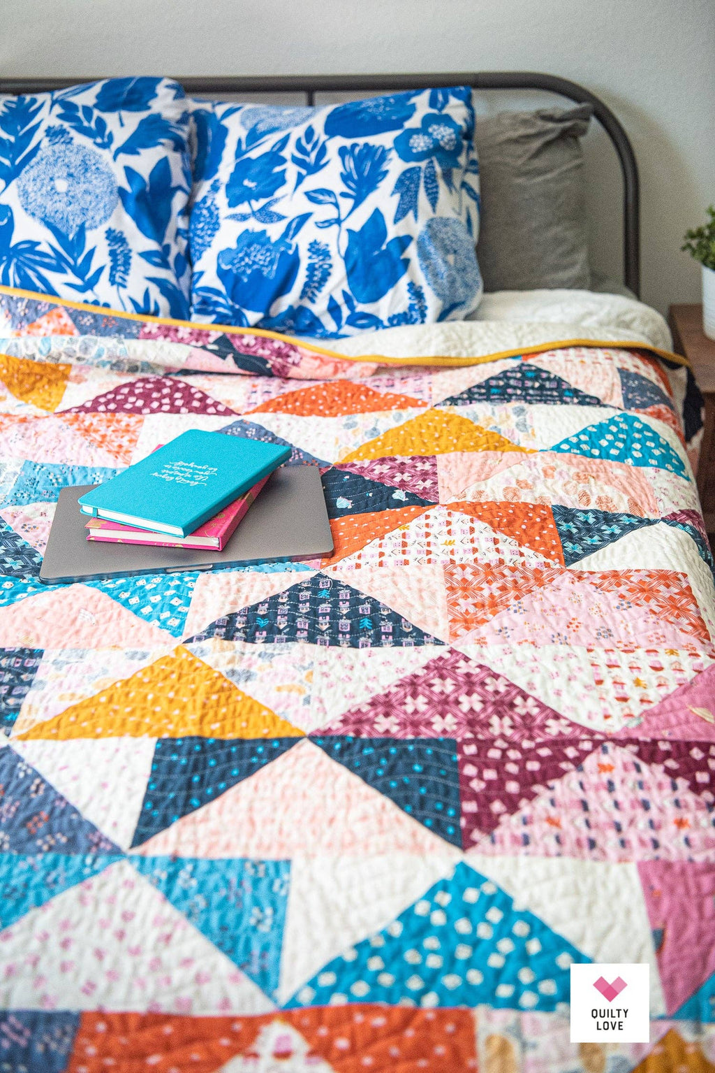 Patchwork Flying Geese Quilt Pattern by Quilty Love | Stash Buster Quilt Pattern