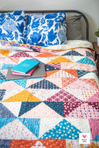 Patchwork Flying Geese Quilt Pattern by Quilty Love | Stash Buster Quilt Pattern