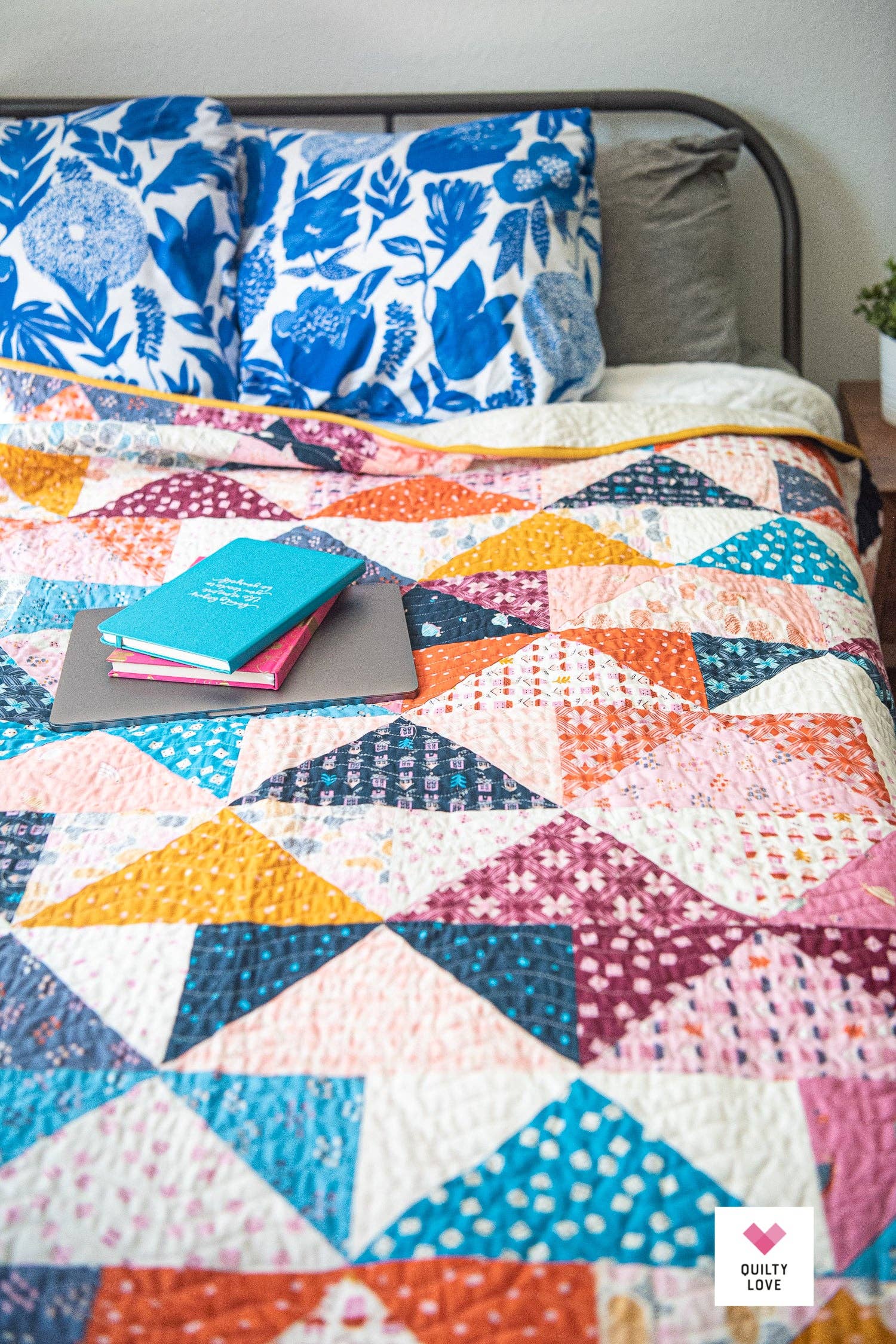 Patchwork Flying Geese Quilt Pattern by Quilty Love | Stash Buster Quilt Pattern