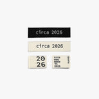 Four labels with 'circa 2026' text on a white background