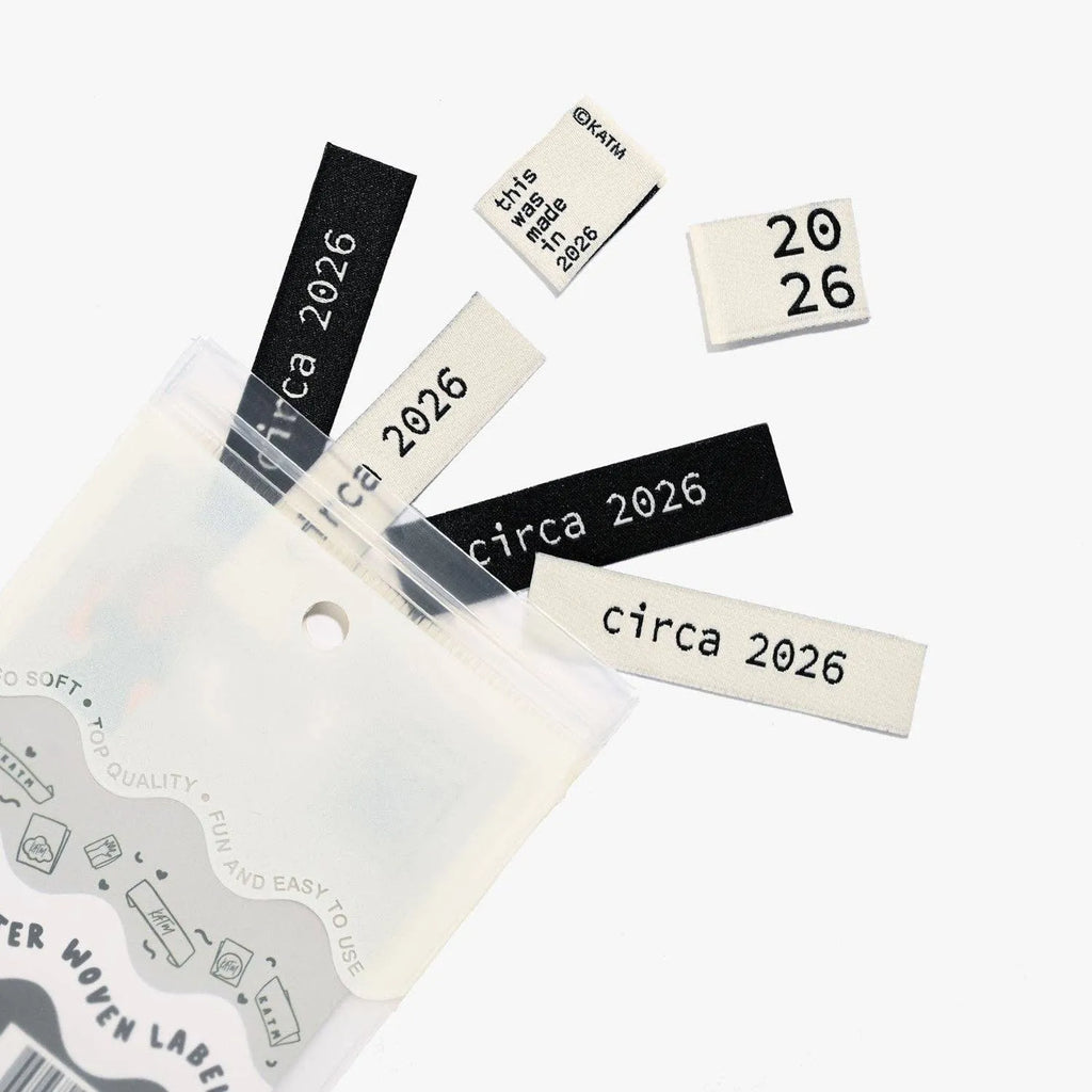 Circa 2026 Woven Labels by KATM in black and white designs.