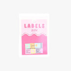 Pack of colorful labels with text on a pink card against a white background KATM Woven Labels