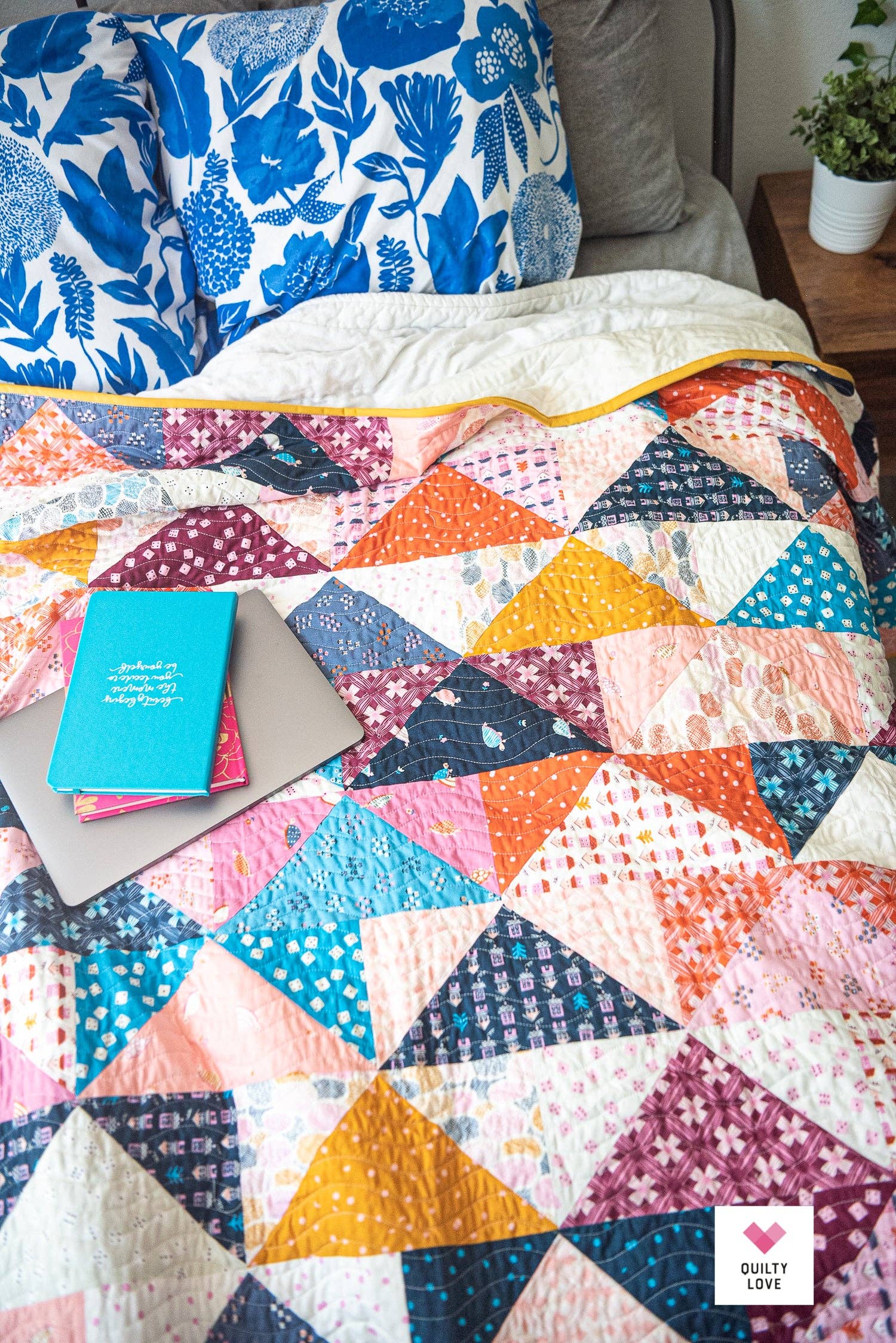 Patchwork Flying Geese Quilt Pattern by Quilty Love | Stash Buster Quilt Pattern
