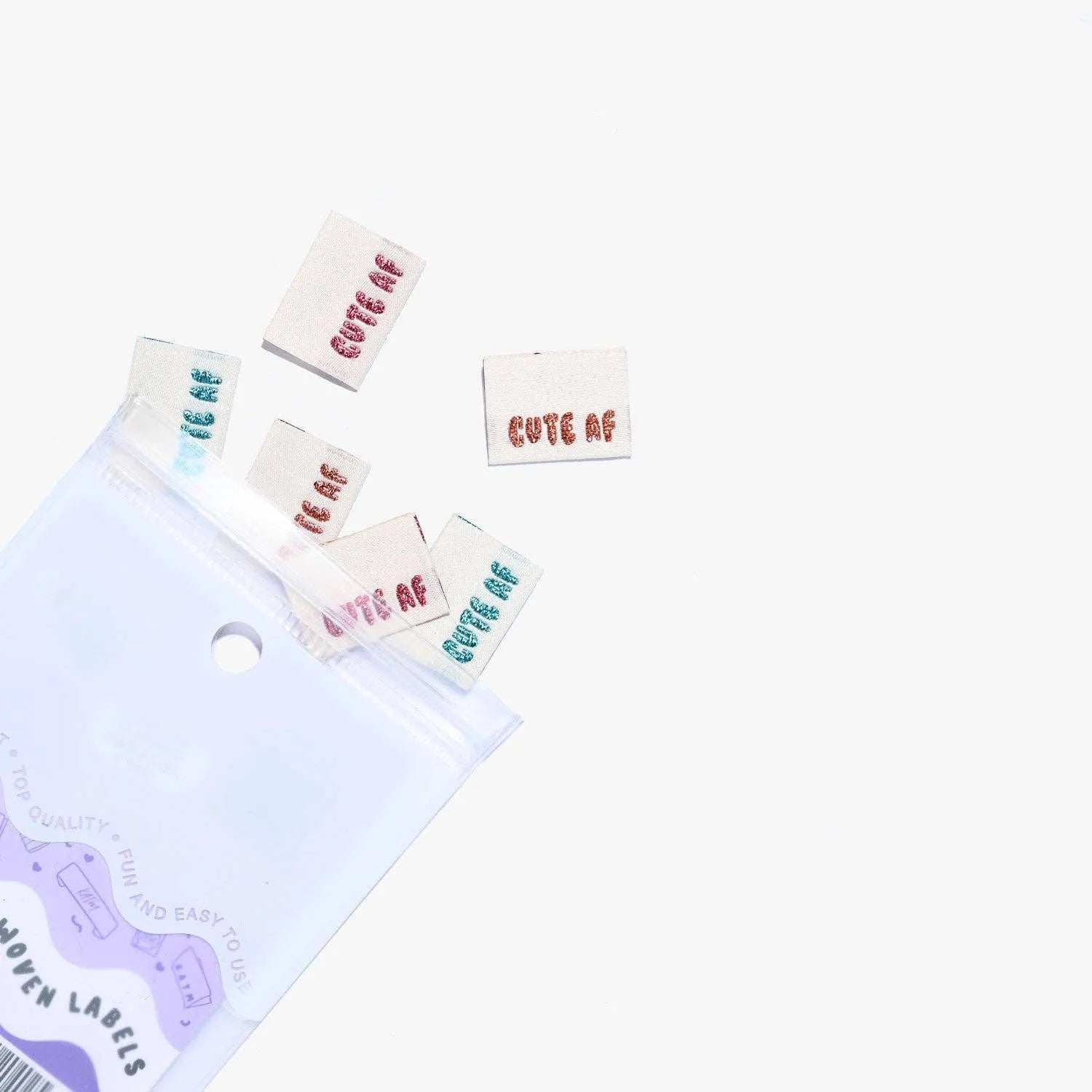 Cute AF! Woven Labels by KATM in assorted colors, perfect for crafts.