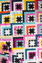 Closeup of Log Cabin Stars by Quilty Love