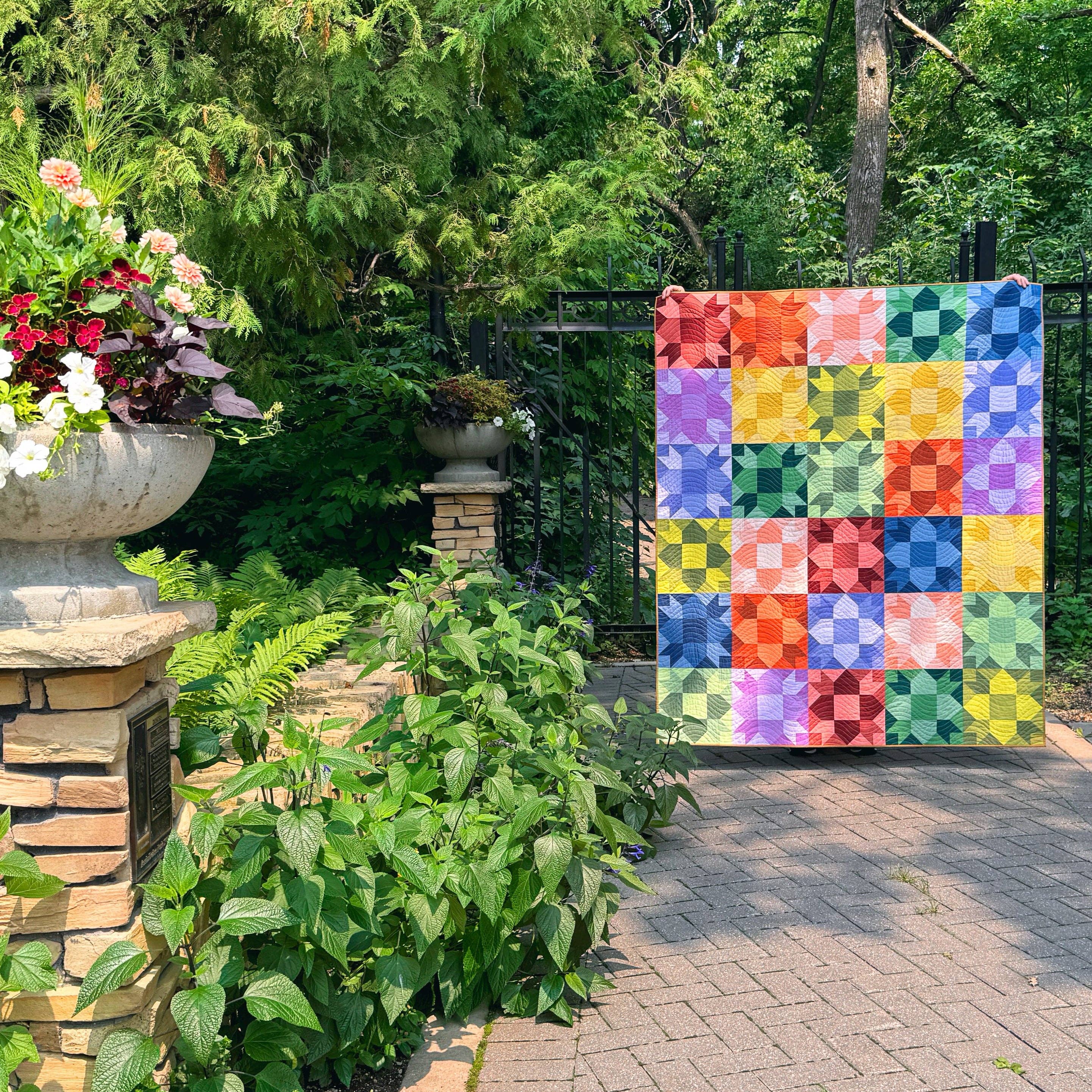 Quilt designed from the Peace Garden Quilt Pattern by The Blanket Statement Quilt Co