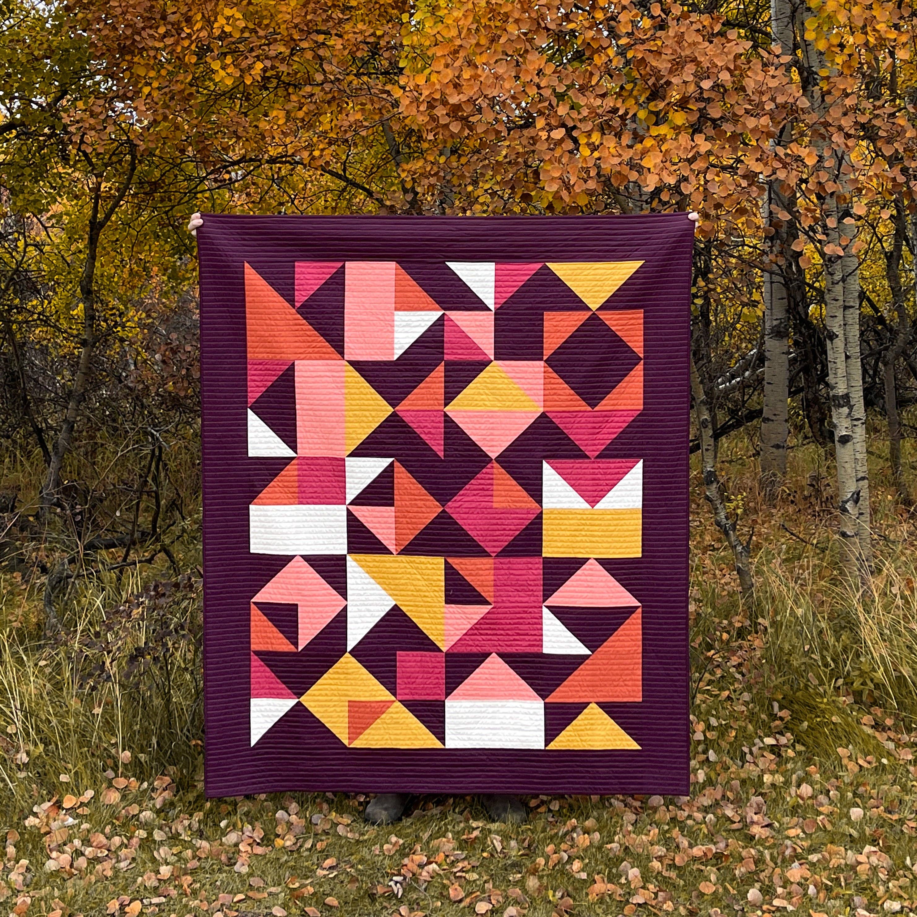 Geometric style quilt made with The Home Street Quilt Pattern by The Blanket Statement Quilt Company