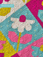 Closeup detail of a quilt from Growing Quilt Pattern by Pen + Paper Patterns 